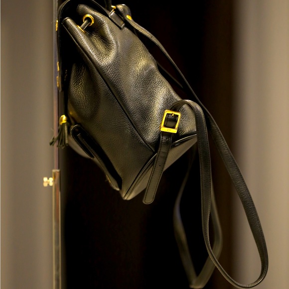 Vintage MCM black backpack w/ golden studded logo motifs & drawstrings - Picture 2 of 5